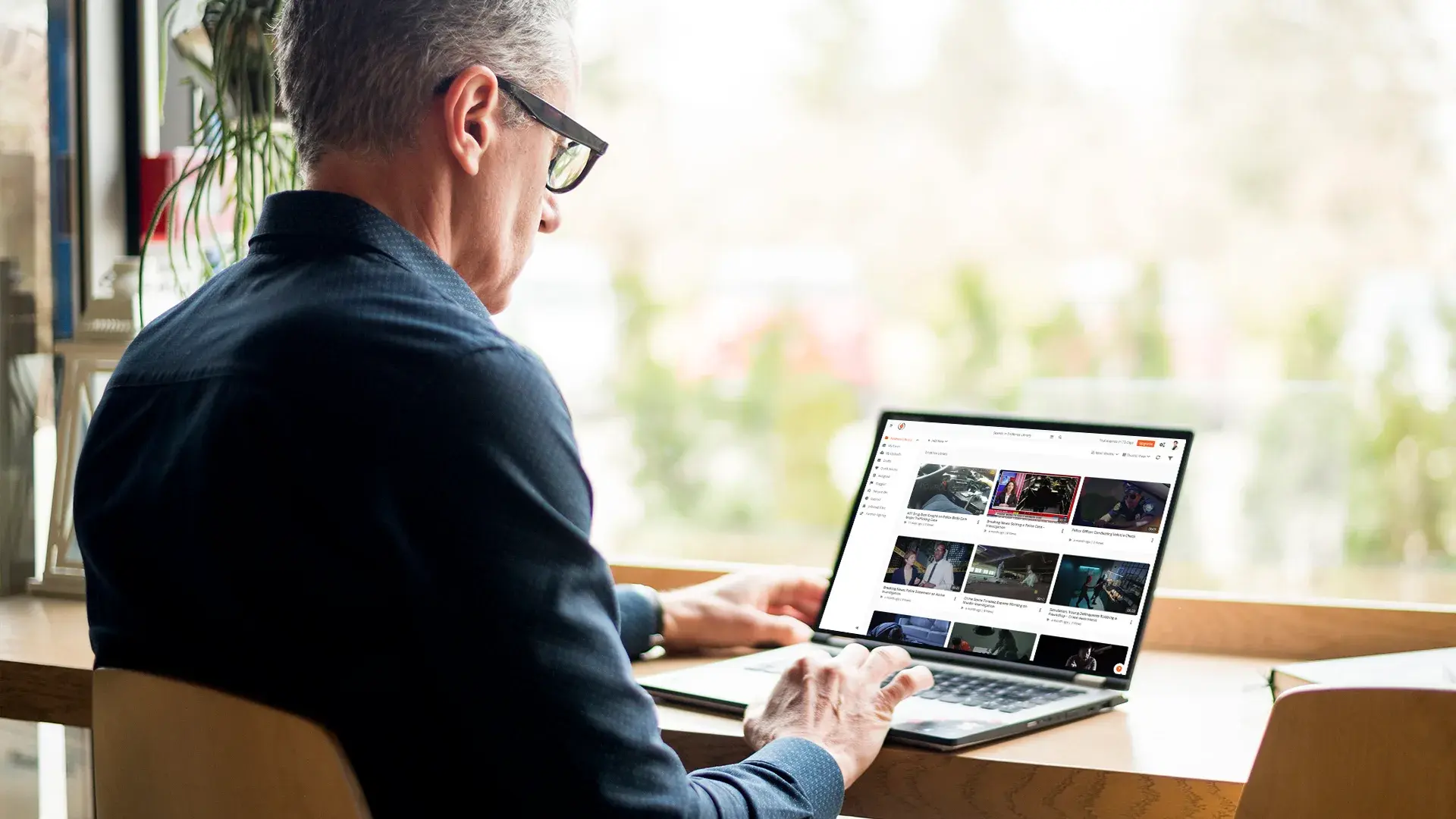 a person using digital evidence management system